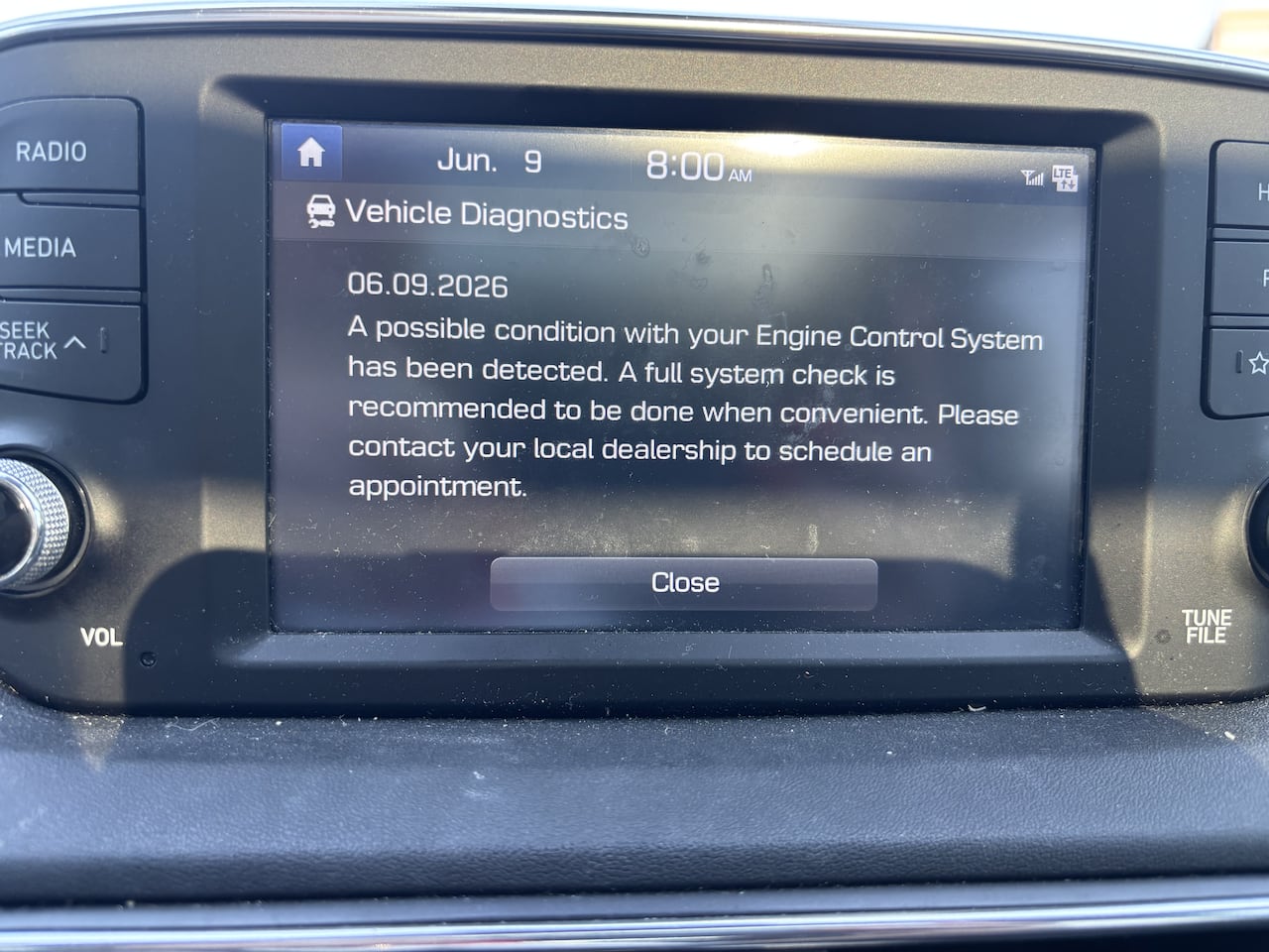 a popup message on the dashboard of a car reads "a possible condition with your engine control system has been detected. A full system check is recommended to be done when convenient. please contact your local dealership to schedule an appointment."