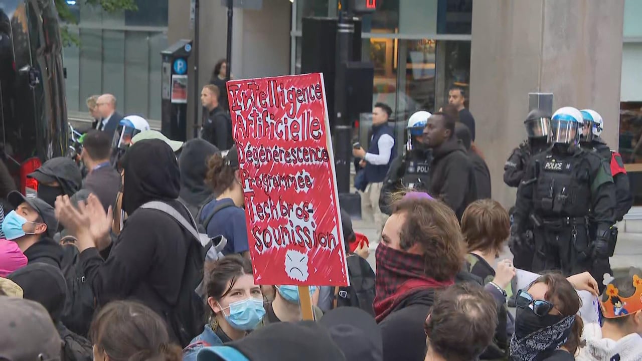 Protesters demonstrating against artificial intelligence outside the AI summit All In in Montreal on Sept. 16, 2026.