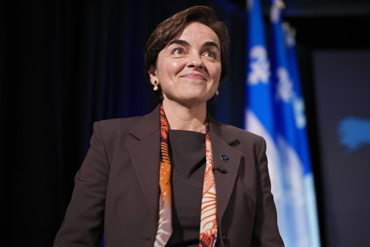 A woman smiling