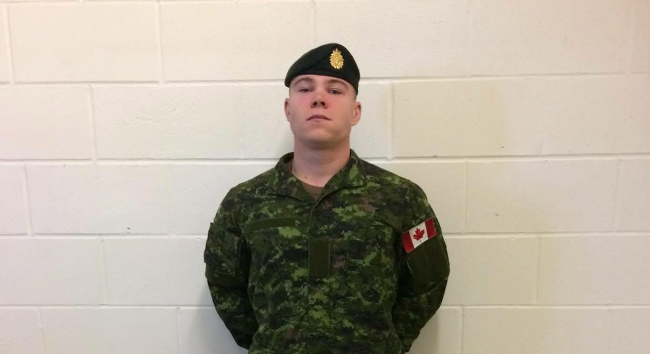 A man wearing a military uniform.
