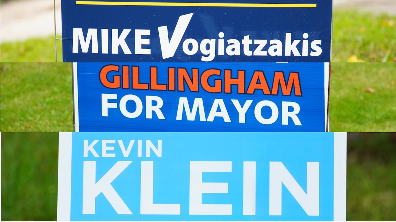 Mayoral race signs for Mike Vogiatzakis, Scott Gillingham and Kevin Klein.