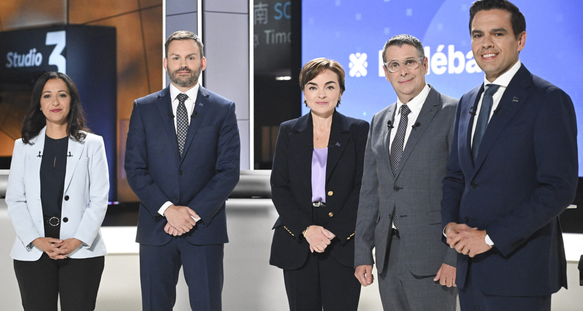 Quebec's five main party leaders pose at the Radio-Canada studios ahead of their debate