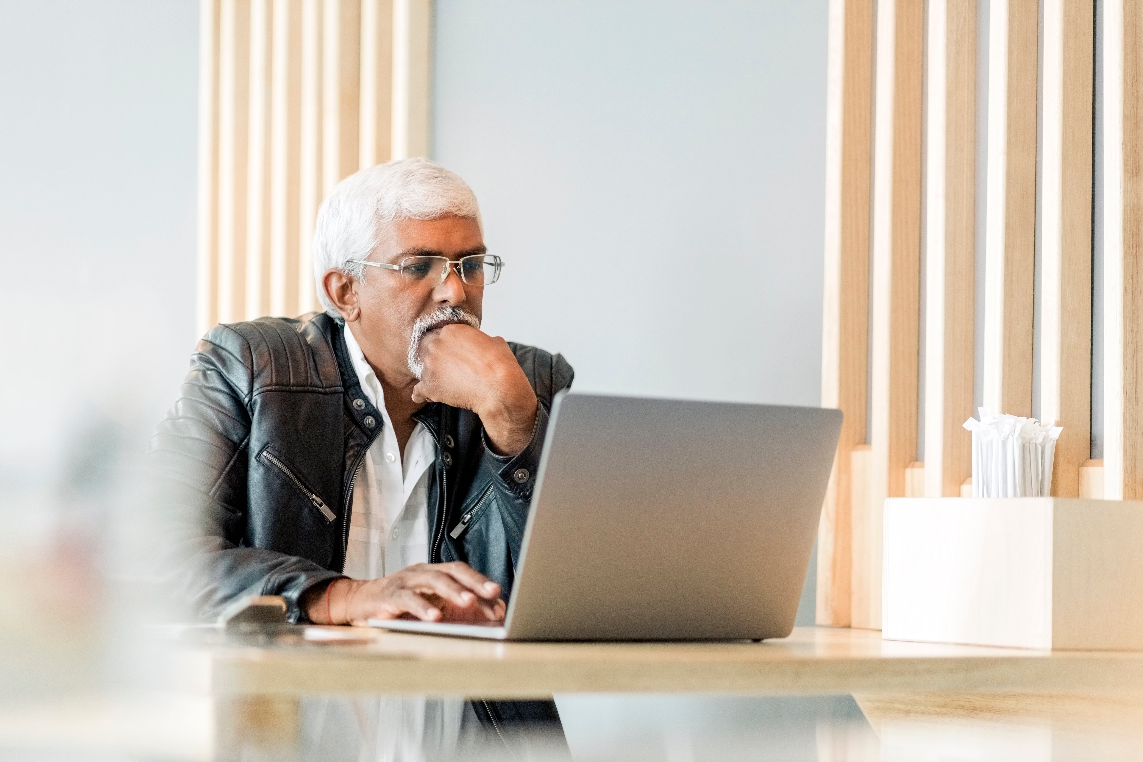 A person at a laptop.