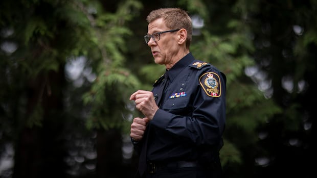Former Surrey police chief challenges termination in court