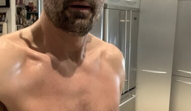 Louis Theroux, 56, has revealed he's been doing Joe Wicks' exercise plan daily but says he loves boozing and used to enjoy 'a nightly spliff' (pictured in 2021 after one of Joe's workouts)