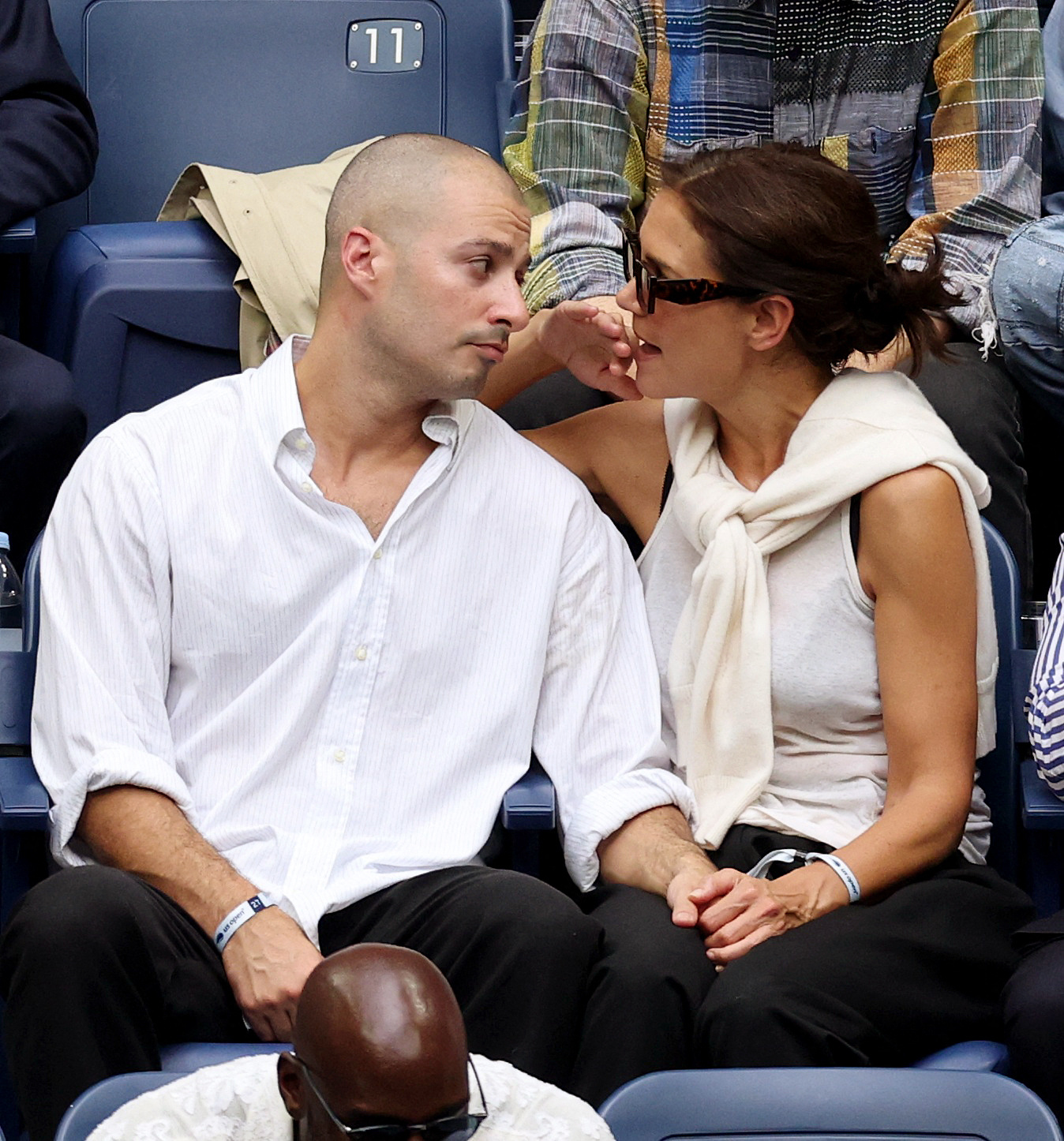 Katie Holmes and Jason Bard Yarmosky in the stands at the U.S. Open.