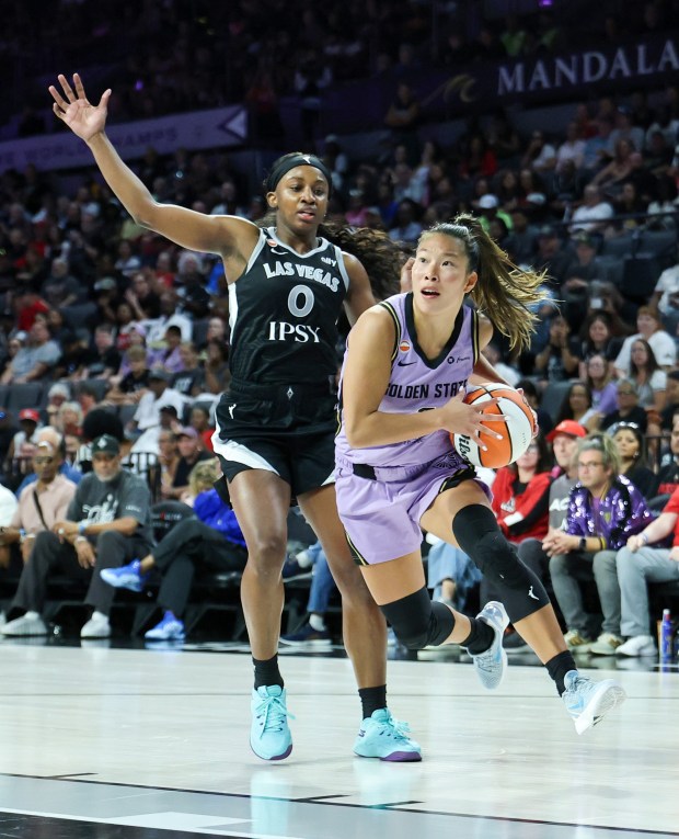 LAS VEGAS, NEVADA - JUNE 21: Kaitlyn Chen #2 of the Golden State Valkyries drives against Jackie Young #0 of the Las Vegas Aces in the third quarter of their game at Michelob ULTRA Arena on June 21, 2026 in Las Vegas, Nevada. The Aces defeated the Valkyries 92-73. NOTE TO USER: User expressly acknowledges and agrees that, by downloading and or using this photograph, User is consenting to the terms and conditions of the Getty Images License Agreement. (Photo by Ethan Miller/Getty Images)