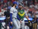 Shea Langeliers of the Athletics speaks with Dylan Cease of the Toronto Blue Jays during the first inning of the 2026 MLB All-Star Game at Citizens Bank Park on Tuesday, July 14, 2026, in Philadelphia, Pa. 