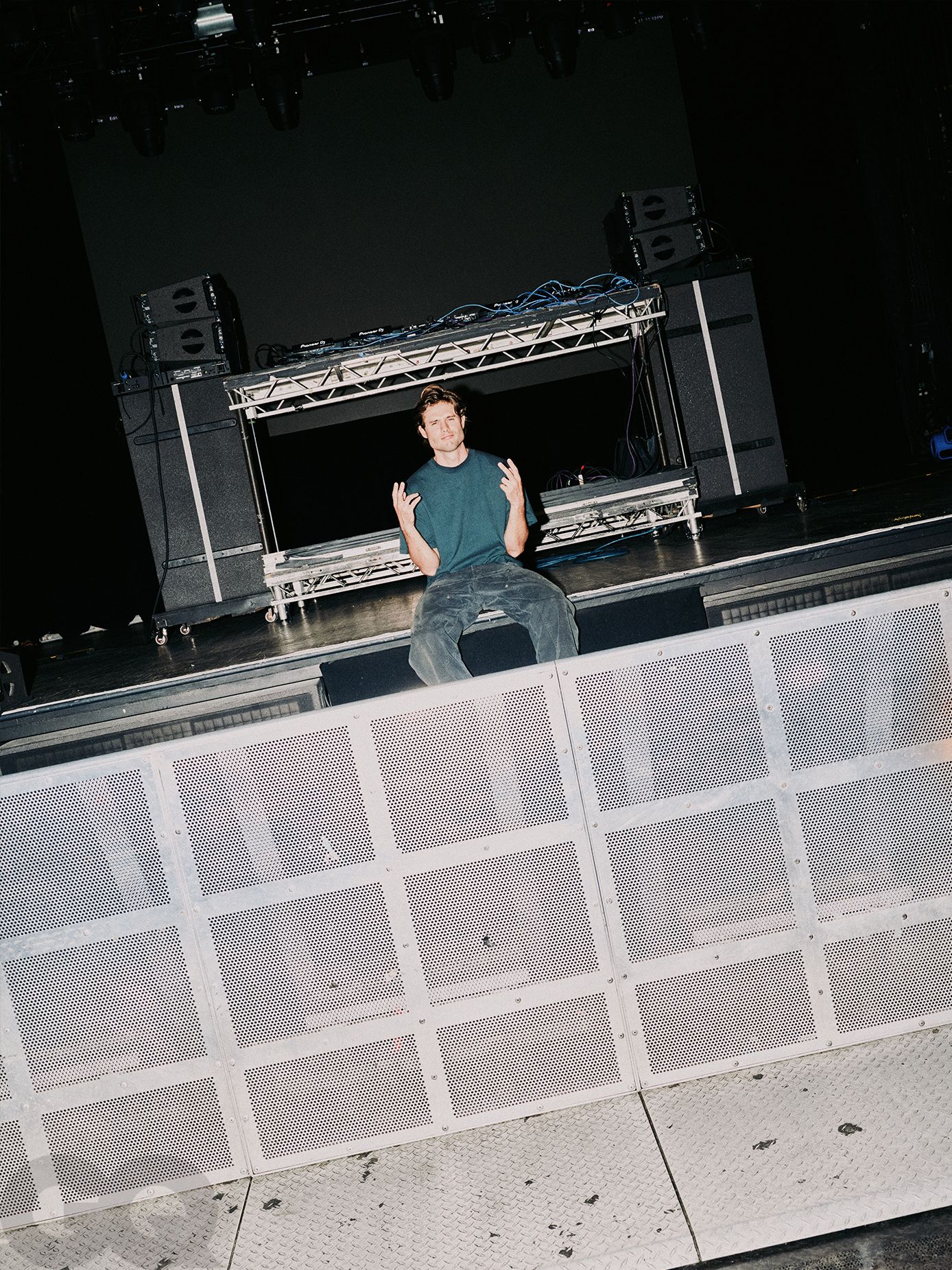 Image may contain Brad Falchuk Performer Person Solo Performance Sitting Adult Clothing and Pants