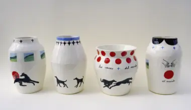 Four white ceramic vessels decorated with hand-painted black silhouettes of dogs, red circular motifs and blue line details, each with text inscriptions