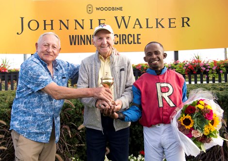 Jockey Jalon Samuel guides Fire and Wine to victory in the $400,000 Breeders's Stakes, the final leg of the Canadian Triple Crown, for owner Paul Ryder and trainer Zeljko Krcmar. Woodbine/Michael Burns Photo