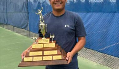 Ramzie Manongsong holds the men’s singles trophy after winning the 2026 Yukon Tennis Championships on Aug. 28. (Stacy Lewis/Submitted)