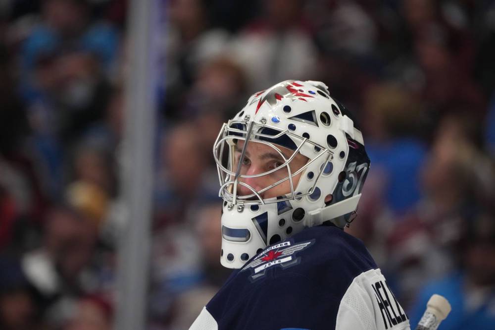 DAVID ZALUBOWSKI/ THE ASSOCIATED PRESS FILES
If Winnipeg Jets goaltender Connor Hellebuyck doesn’t report for training camp this week, the club is likely to suspend the franchise netminder for withholding his services.