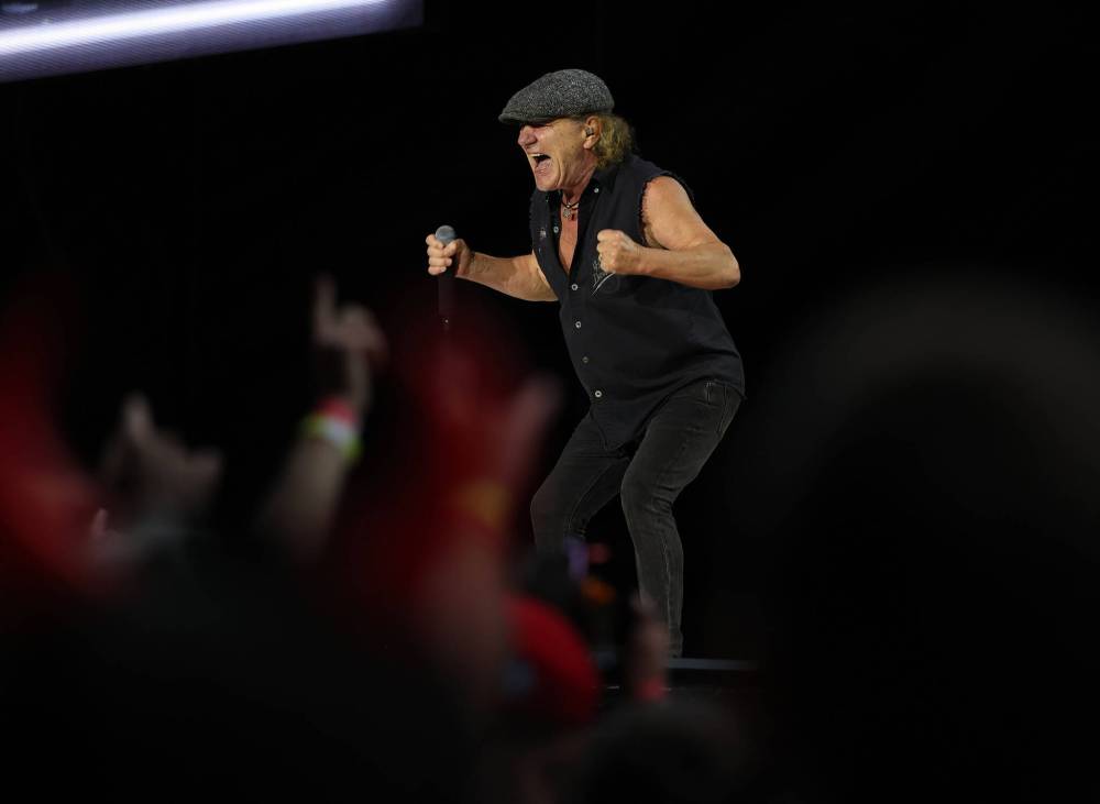 JASON HALSTEAD / FREE PRESS
Singer Brian Johnson’s raspy growl was in fine form Sunday.