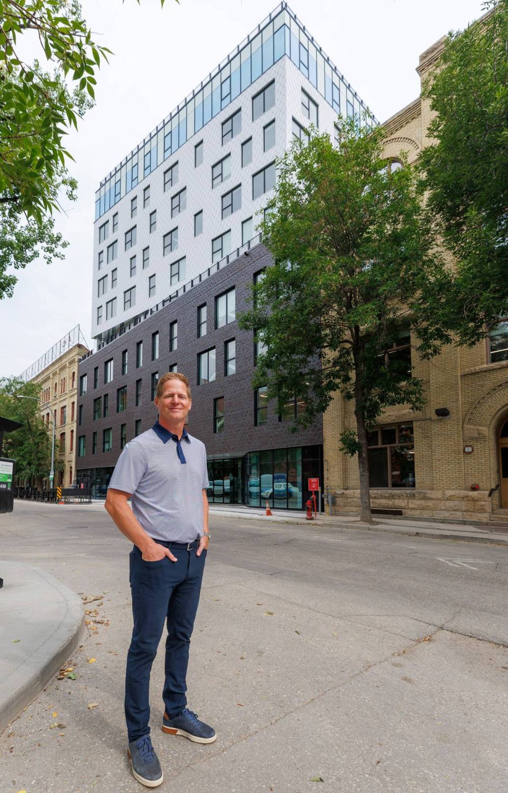 MIKE DEAL / FREE PRESS FILES
Nolan Ploegman, president and CEO of Concord Projects, outside his company’s headquarters at 127 Bannatyne Avenue.