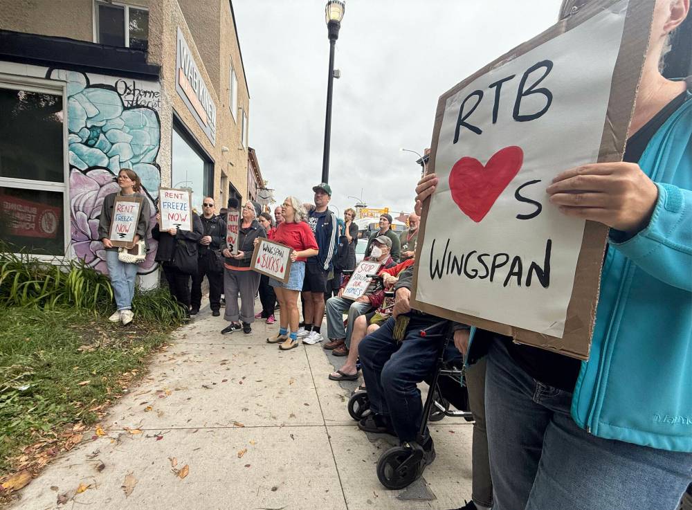 SCOTT BILLECK / FREE PRESS
Protesters line the sidewalk outside Premier Wab Kinew’s constituency office on Osborne Street Friday afternoon, calling on the Residential Tenancies Branch to freeze disputed rent increases until tenants have a chance to challenge them.