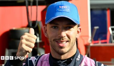 Pierre Gasly gives a thumbs-up at the camera after taking pole position for the Italian Grand Prix