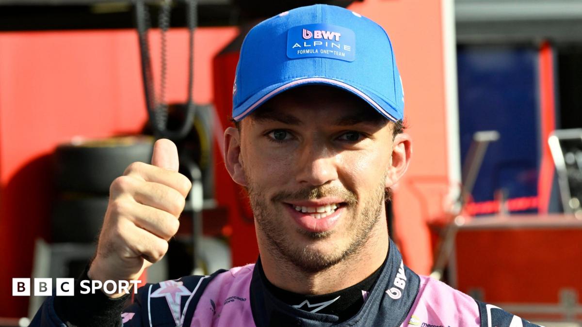 Pierre Gasly gives a thumbs-up at the camera after taking pole position for the Italian Grand Prix