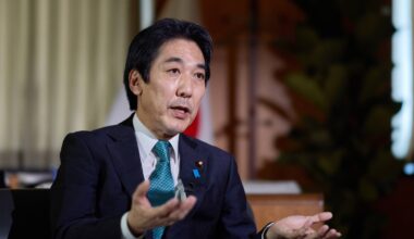 Japan growth minister says economy has exited reflationary phase