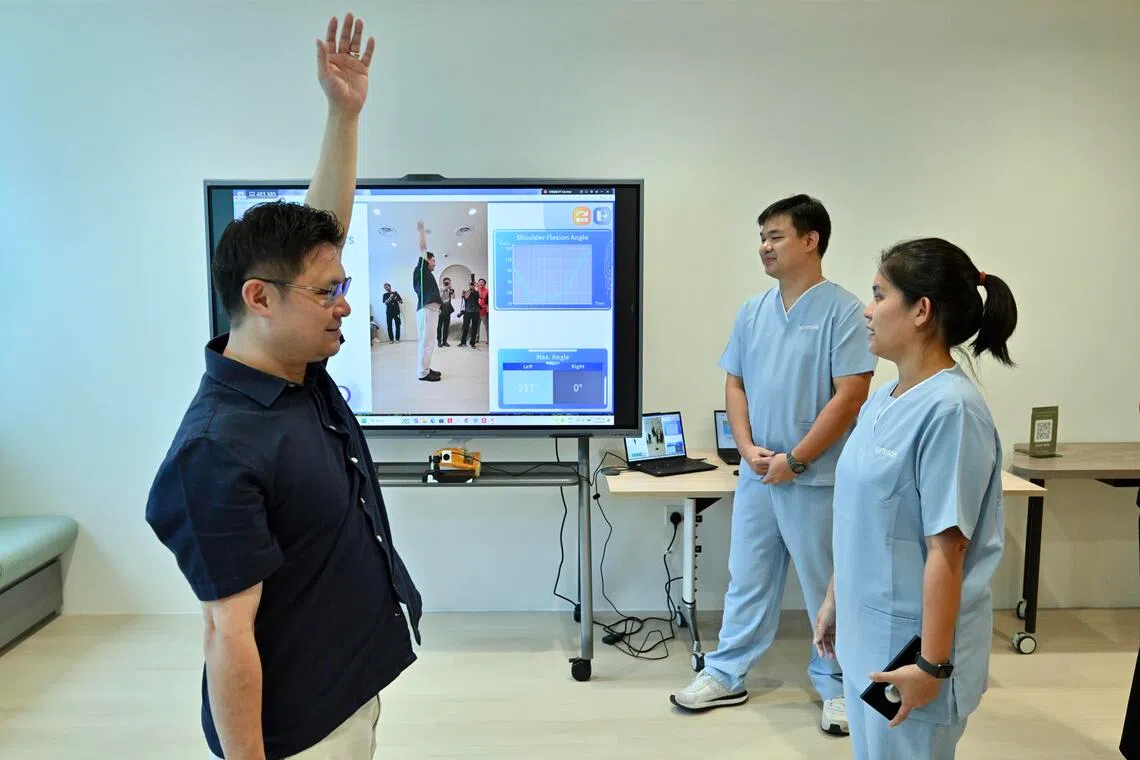 Minister of State for Manpower and Trade and Industry Foo Cexiang trying the Musculoskeletal physiotherapy services which helps to manage pain, sports injuries and rehabilitation.