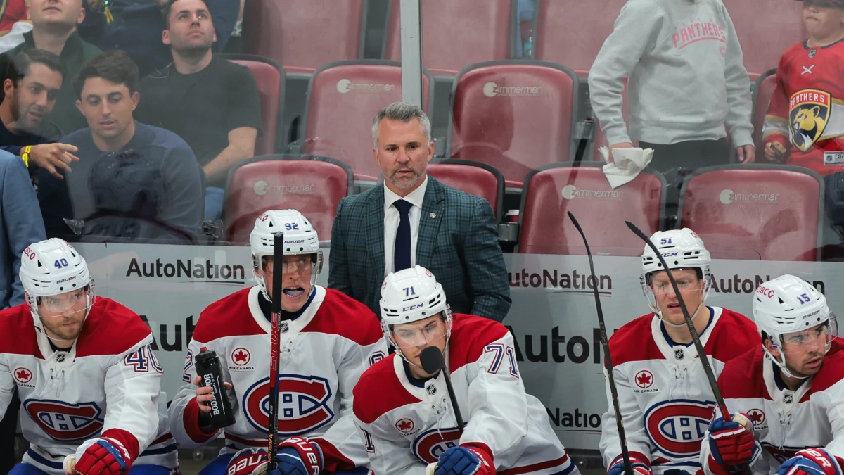 Montreal Canadiens head coach Martin St-Louis watches from the bench against the Florida Panthers during the third period at Amerant Bank Arena.