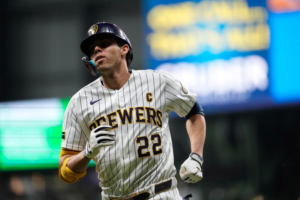 Milwaukee Brewers' Christian Yelich jogs to the dugout after flying out during the sixth inning of a baseball game against the St. Louis Cardinals, Saturday, Sept. 26, 2026, in Milwaukee. (AP Photo/Aaron Gash)