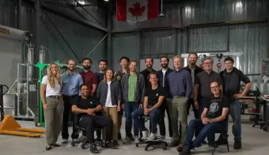 The Canadian Rocket Company team poses together in their lab.