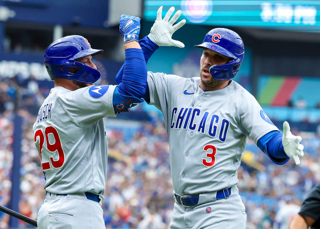 Chicago Cubs designated hitter Alex Bregman (3) celebrates with teammate Michael Busch (29) after hitting his second home run of a baseball game in the third inning against the Boston Red Sox, Sunday, Sept. 27, 2026, in St. Petersburg, Fla. (Chris Urso/AP)