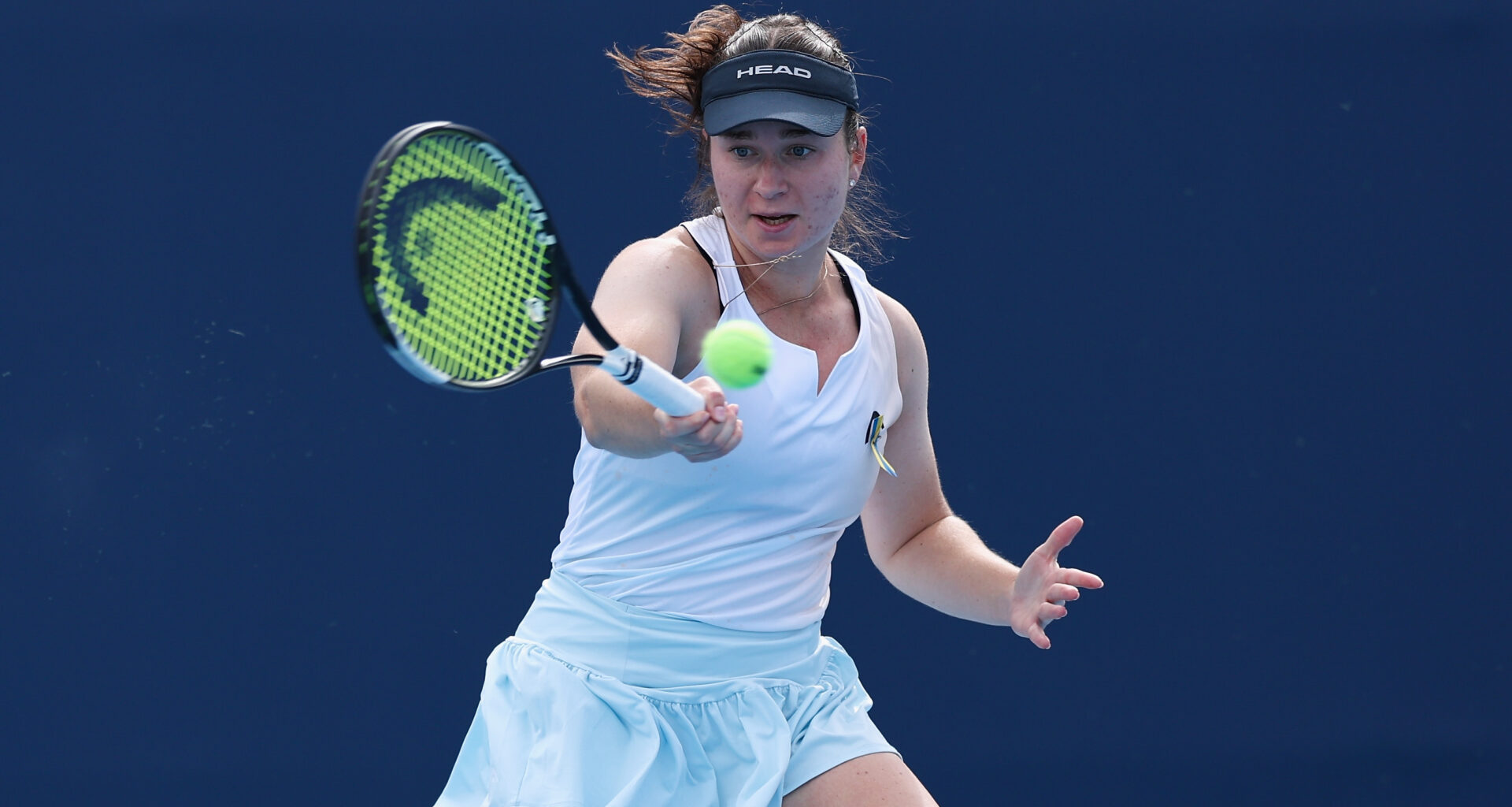 Hot shot: Snigur opens court with angled backhand before hitting forehand winner