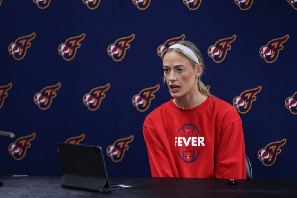 Sophie Cunningham #8 of the Indiana Fever speaks during a press conference before a game against the Portland Fire at Moda Center on July 31, 2026 in Portland, Oregon.