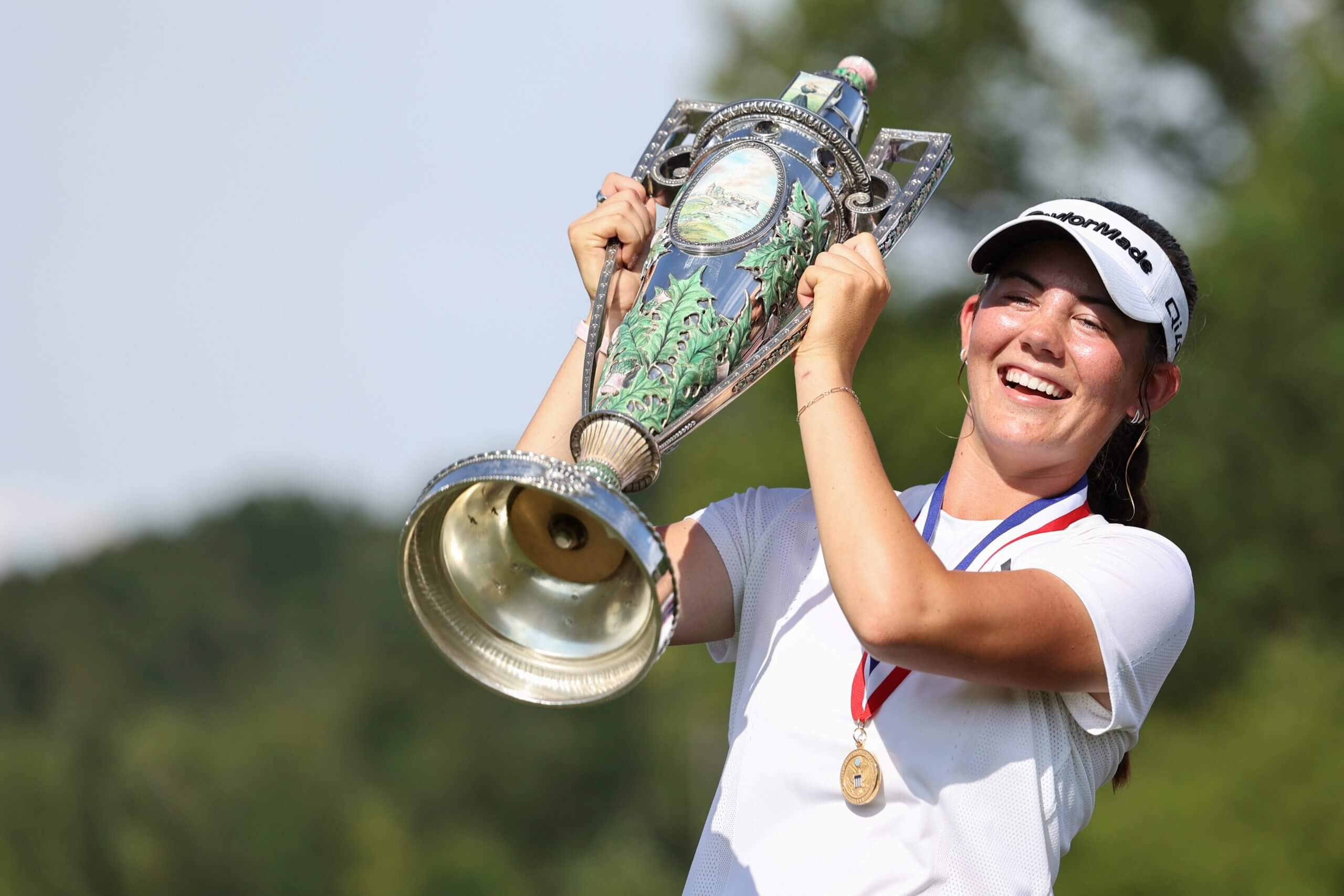 Asterisk Talley holds up the trophy in celebration of  winning the U.S. Women's Amateur last month. 