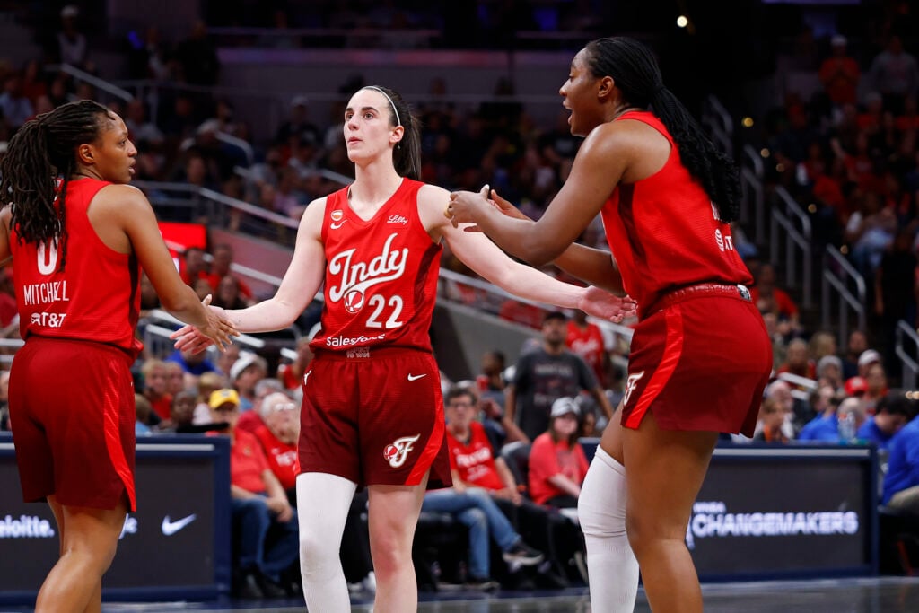 Indiana Fever guard Caitlin Clark (22), Indiana Fever guard Kelsey Mitchell (0) and Indiana Fever center-forward Aliyah Boston (7) in the second half of play during a WNBA game between the Dallas Wings and the against the Indiana Fever