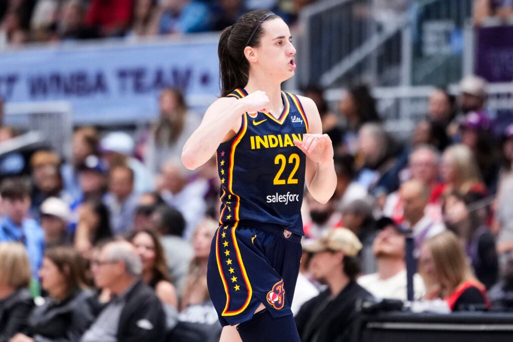 Caitlin Clark #22 of the Indiana Fever celebrates against the Toronto Tempo during the second half of their WNBA basketball game at the Coca-Cola Coliseum