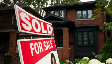 Higher mortgage rates will add more downward pressure on housing prices, economists say