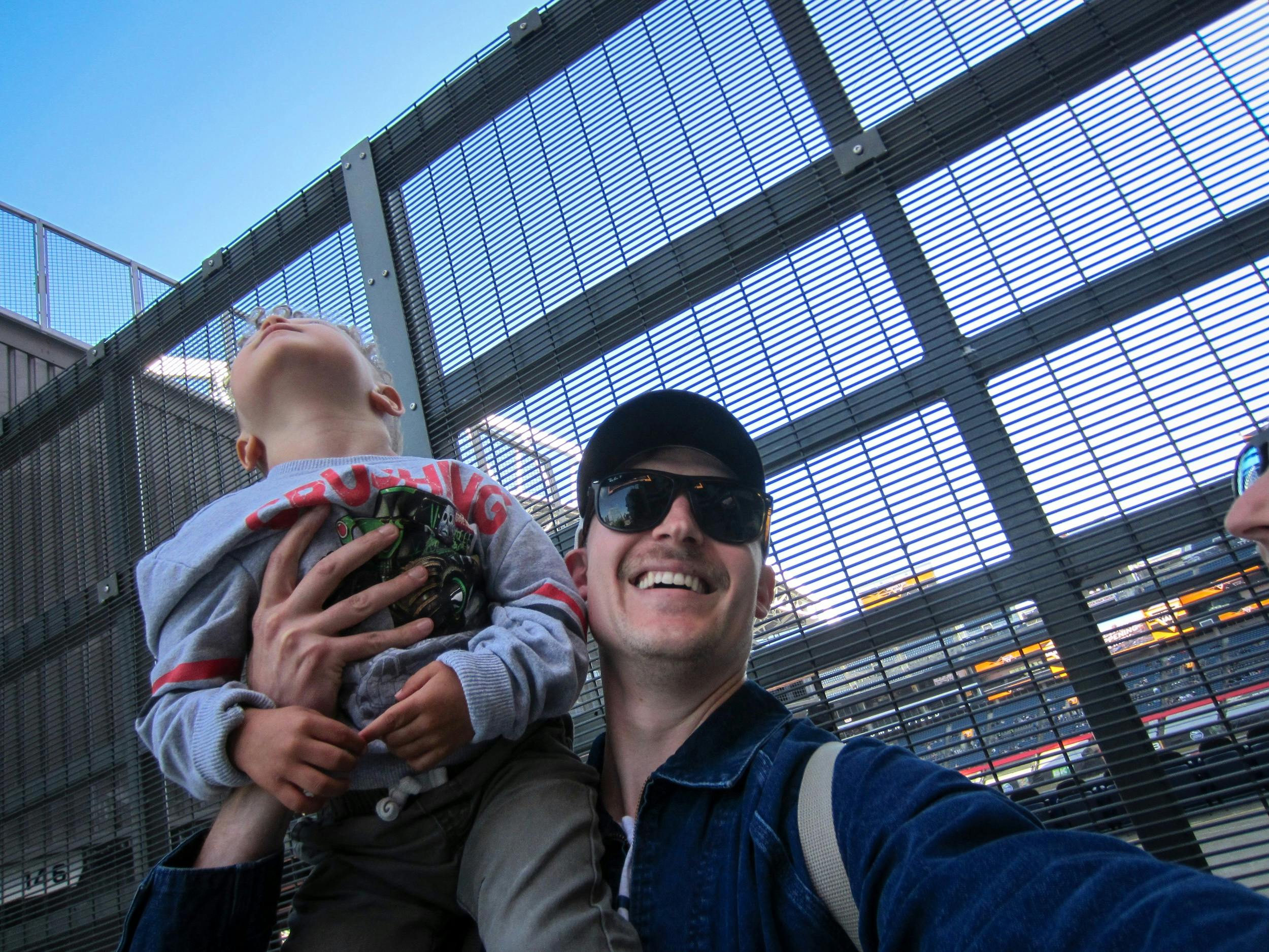 Family monster truck event dad and son