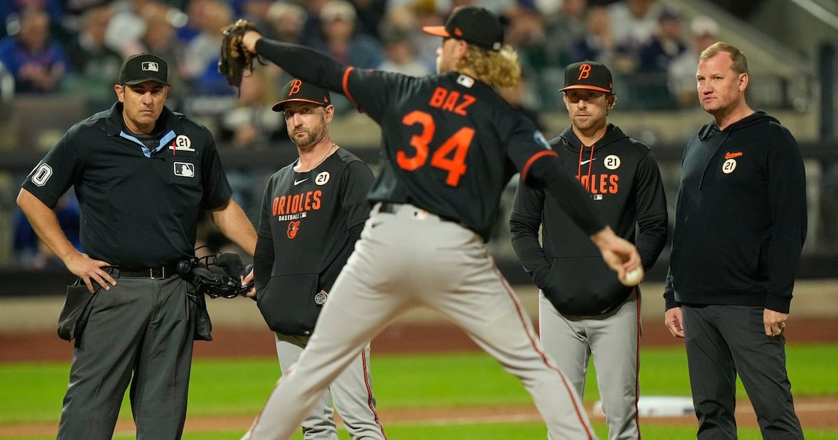 Baltimore Oroles' Shane Baz exits after being hit in arm by line drive vs. New York Mets