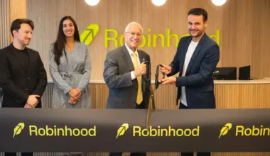 A ribbon-cutting ceremony for Robinhood's new Toronto office.