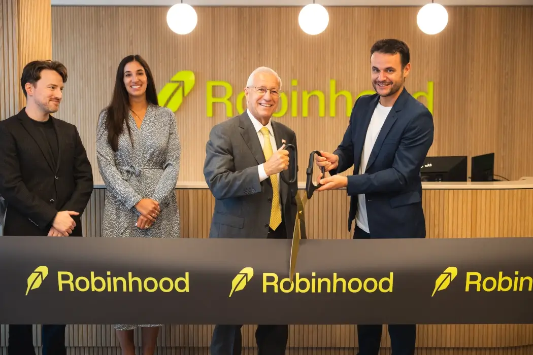 A ribbon-cutting ceremony for Robinhood's new Toronto office.