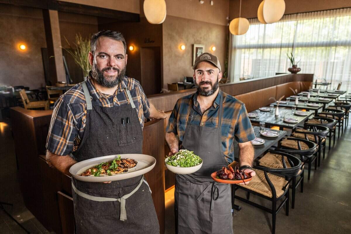Restaurateurs Brad Cecchi and Patricio Wise pose for a portrait in Folsom in 2024.