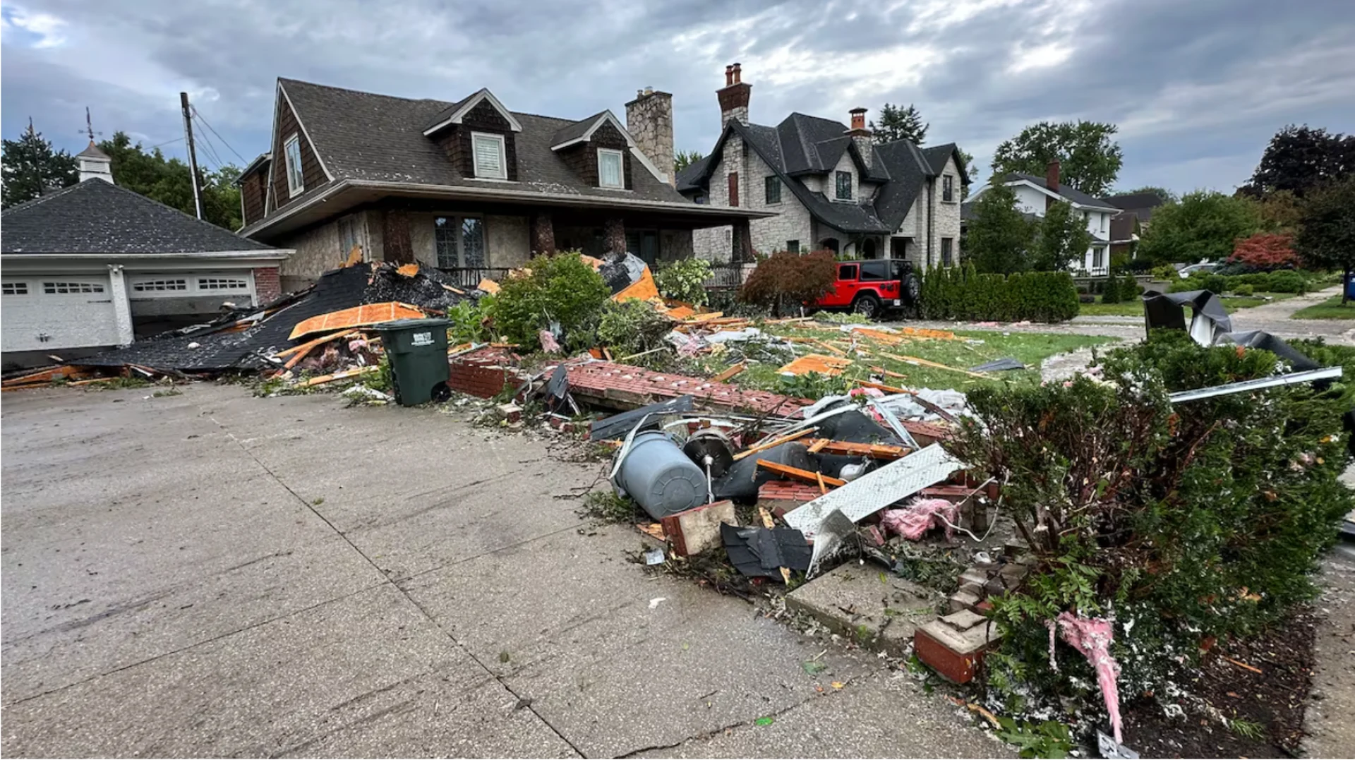 CBC: This house on Ford Boulevard is covered in debris after a tornado ripped through Windsor's Riverside neighbourhood. (Dalson Chen/CBC)