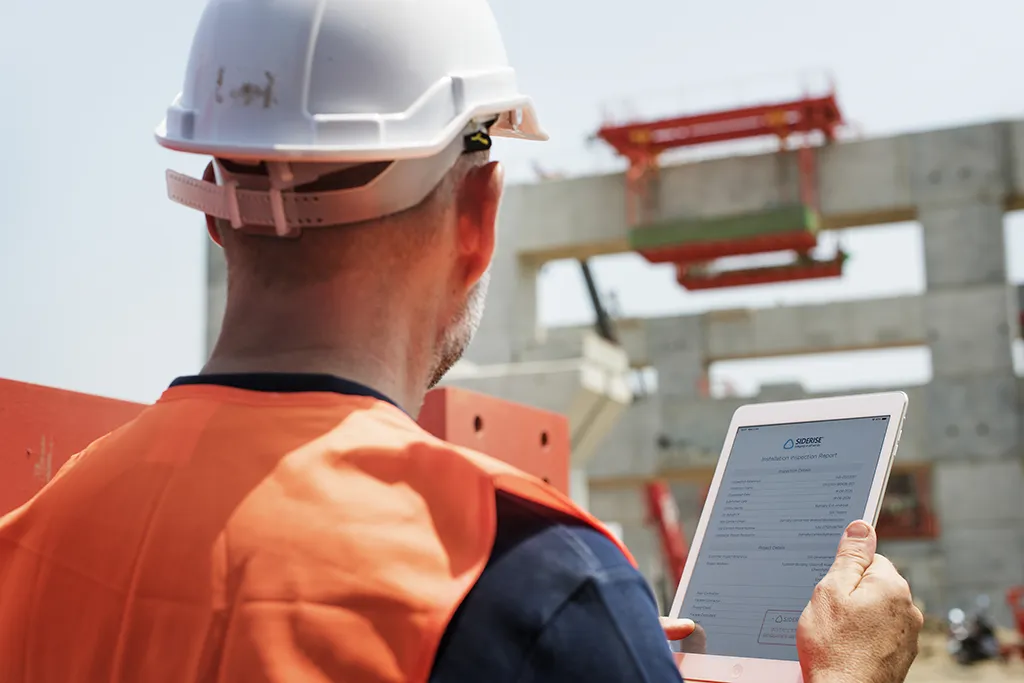 Siderise-inspection-app-man-on-site-inspection-report.webp