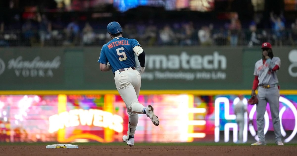 Garrett Mitchell hits grand slam and MLB-best Brewers pound Reds to clinch playoff spot