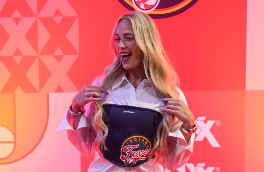 Indiana Fever guard Sophie Cunningham (8) arrives Tuesday, Aug. 26, 2025, before a game between the Indiana Fever and the