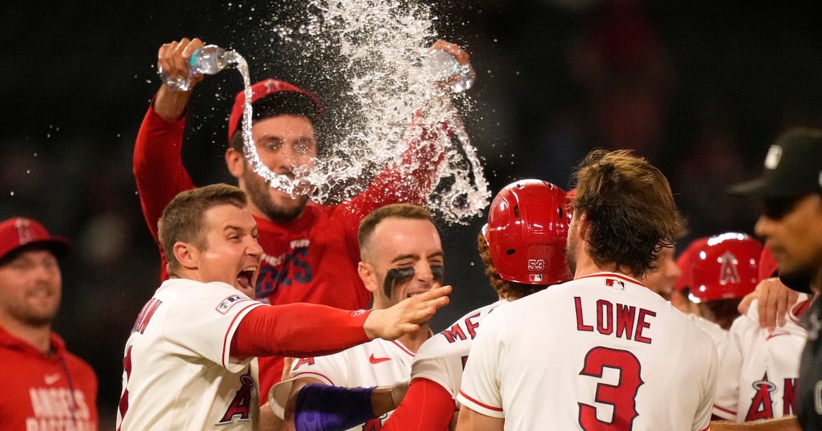 Los Angeles Angels blow ninth-inning lead, then rally for two in 10th to edge Minnesota Twins
