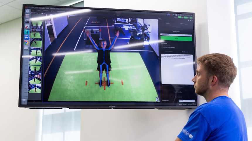 A student uses AI for research in the athletics department on June 10, 2025.