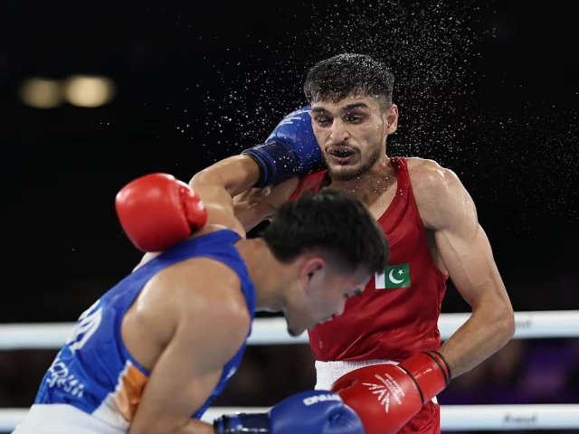 sumama rahman pakistan s solid boxer fights against jadumani singh of india in the 55 kilogramme bout at the 2026 glasgow commonwealth games sumama loses 5 0 photo afp