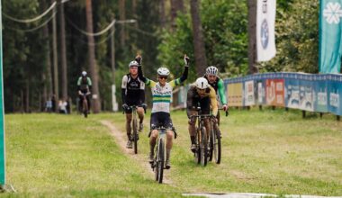 Tiffany Cromwell celebrates as she crosses the line to win the Tartu Bike Marathon