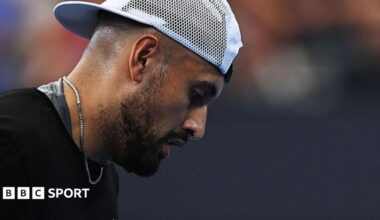 Nick Kyrgios looks down during a match