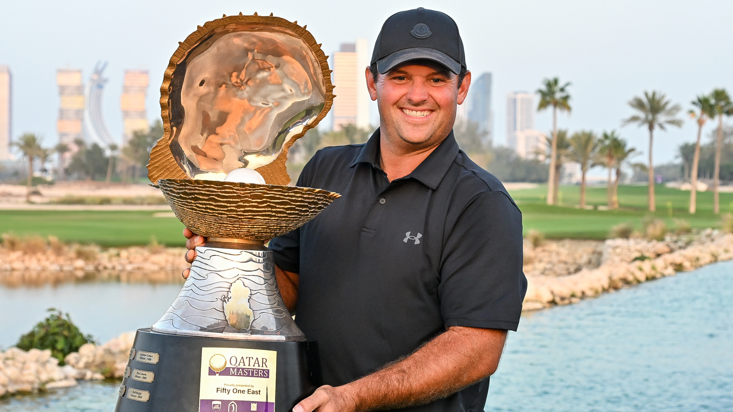 Patrick Reed with the Qatar Masters trophy