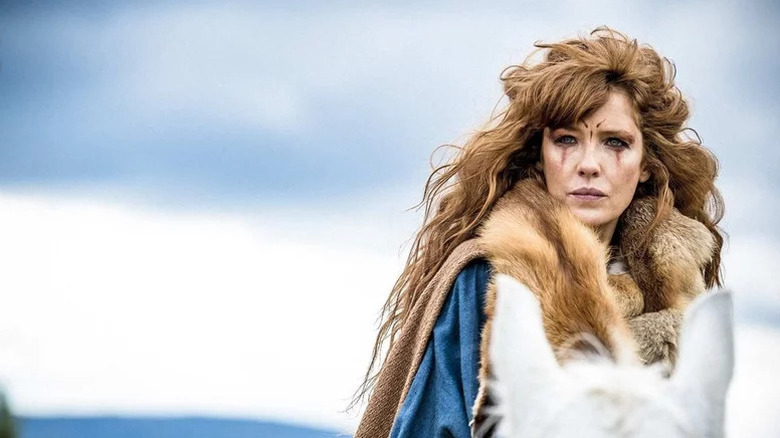 Kelly Reilly as Kerra riding a white horse in Britannia.